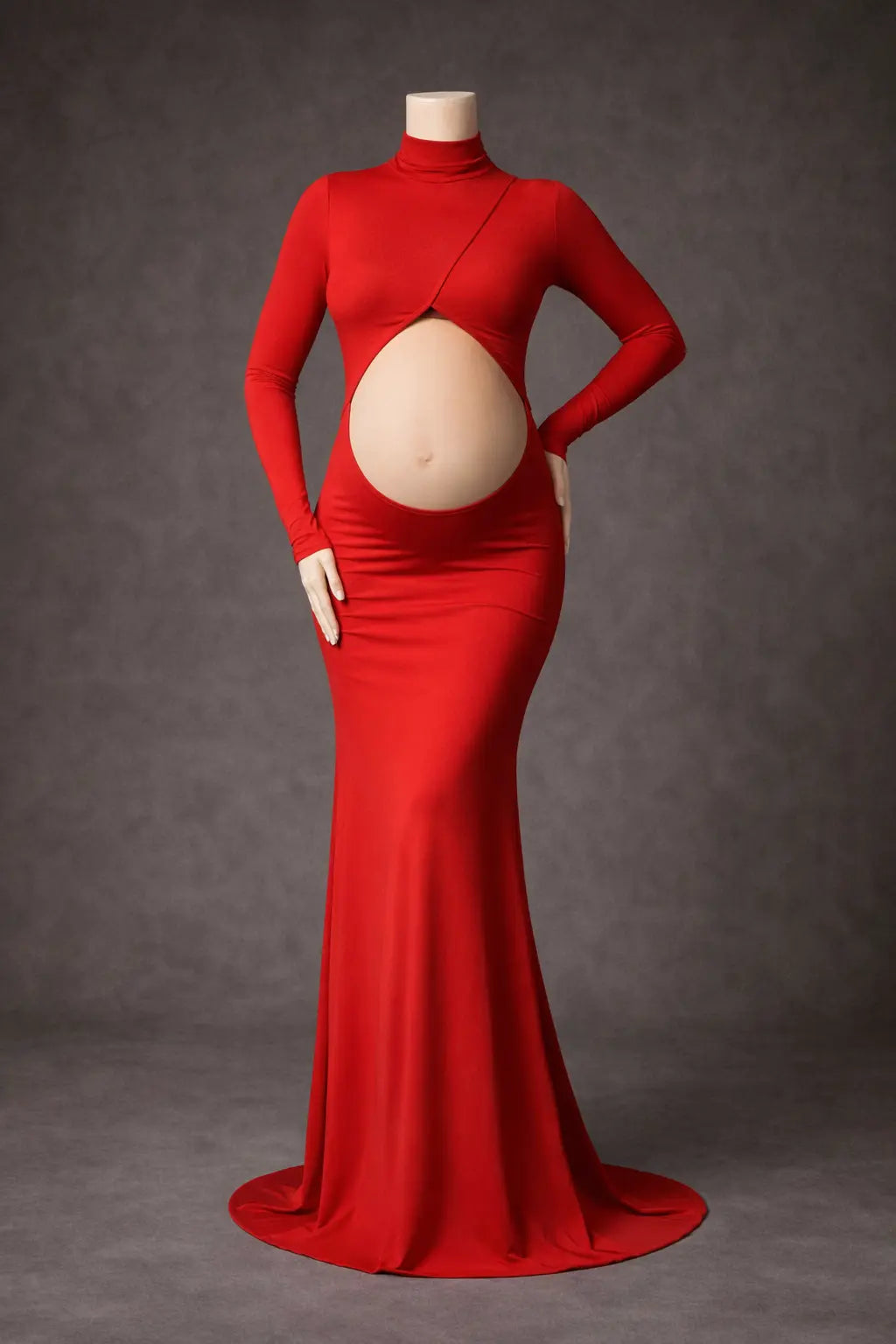 Red evening gown on a mannequin with a grey background for maternity photo shoot