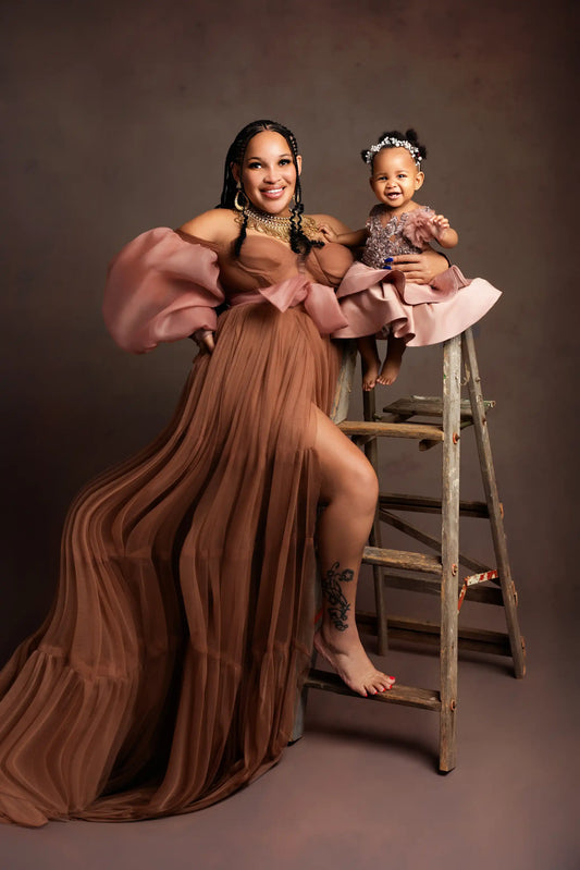 Mom & child photo shoot against a darker colour background